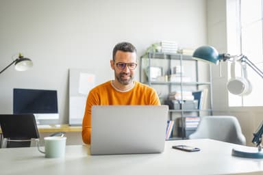 Man checks credit score on a laptop.