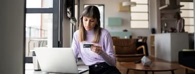 Young woman checking her credit