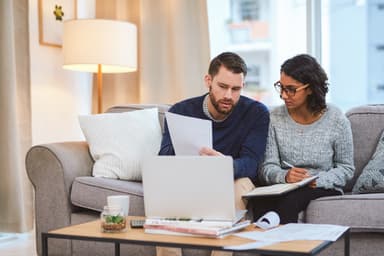 Couple discussing their finances.