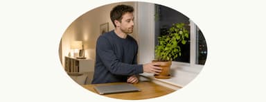 Man looks at his plants and contemplates loan choices.